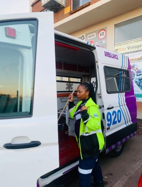 A medic at the back of an ambulance